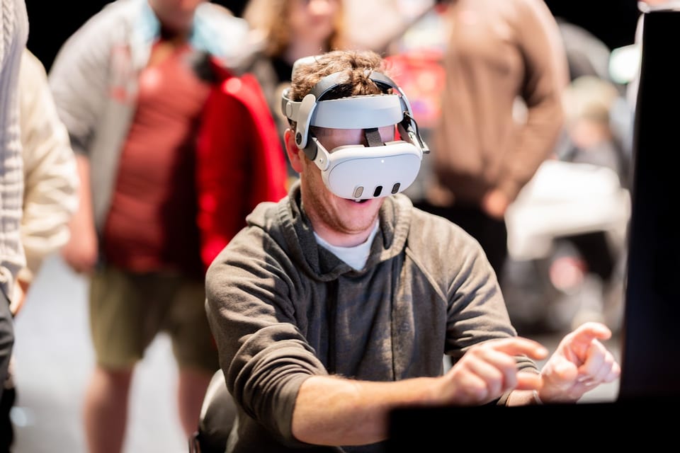 Attendee playing a VR game demo at Vancouver Game Expo