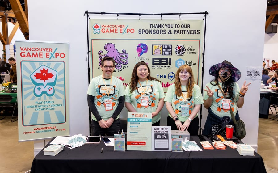 Vancouver Game Expo volunteers at the information booth
